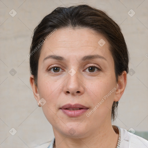 Joyful white adult female with short  brown hair and brown eyes