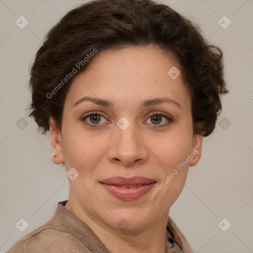 Joyful white adult female with short  brown hair and grey eyes