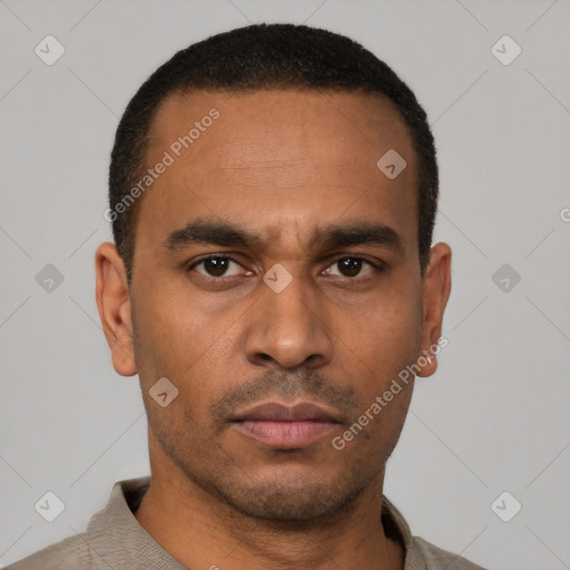 Neutral latino young-adult male with short  black hair and brown eyes