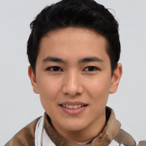 Joyful asian young-adult male with short  brown hair and brown eyes