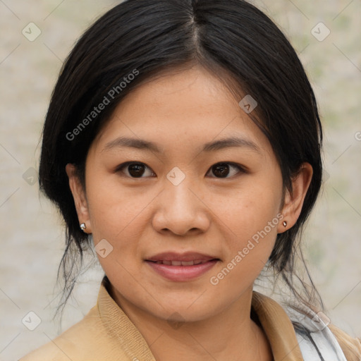 Joyful asian young-adult female with medium  brown hair and brown eyes