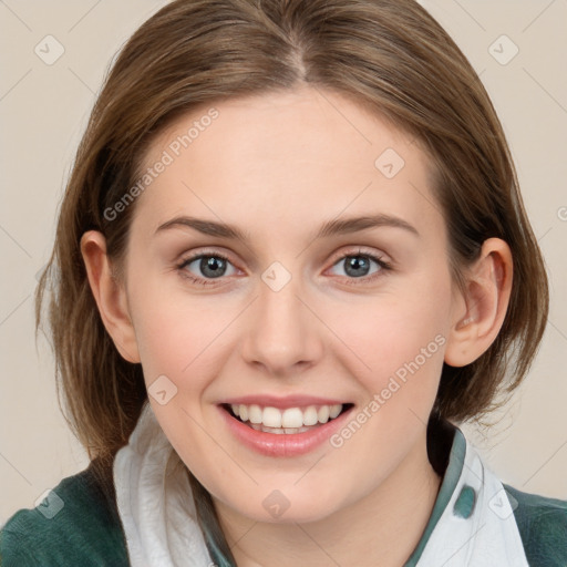 Joyful white young-adult female with medium  brown hair and blue eyes