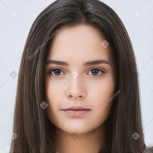 Neutral white young-adult female with long  brown hair and brown eyes