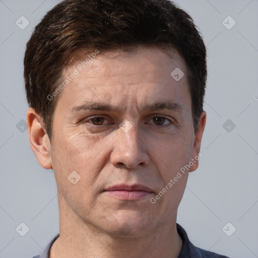 Neutral white adult male with short  brown hair and brown eyes