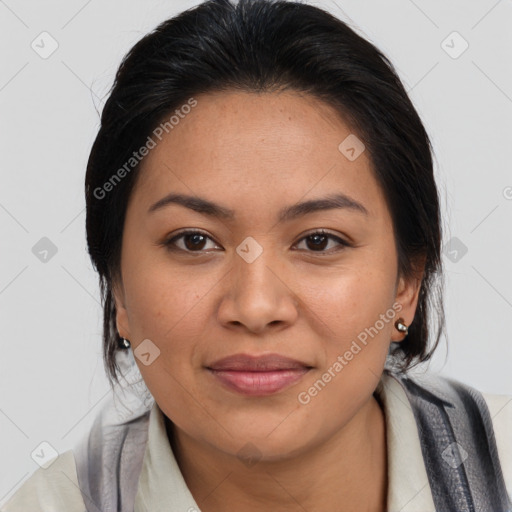 Joyful latino young-adult female with medium  brown hair and brown eyes