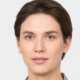 Neutral white young-adult female with short  brown hair and brown eyes