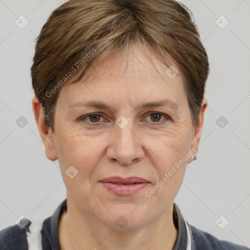 Joyful white adult female with short  brown hair and grey eyes