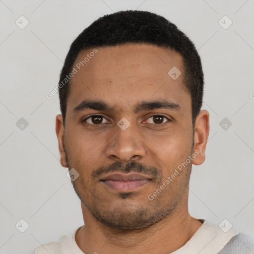 Neutral latino young-adult male with short  black hair and brown eyes