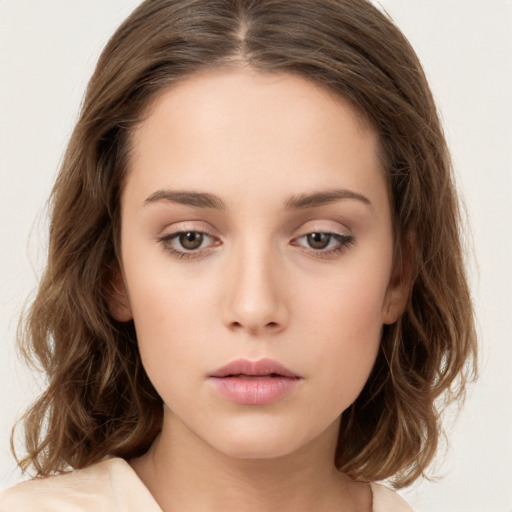 Neutral white young-adult female with medium  brown hair and brown eyes