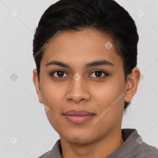 Joyful latino young-adult female with short  brown hair and brown eyes