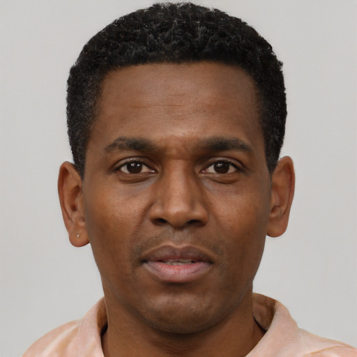 Neutral black young-adult male with short  black hair and brown eyes