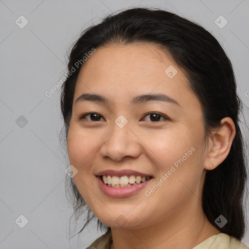 Joyful asian young-adult female with medium  brown hair and brown eyes