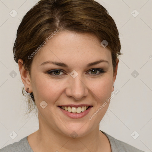 Joyful white young-adult female with medium  brown hair and green eyes