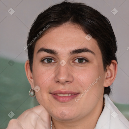 Joyful white adult female with medium  brown hair and brown eyes