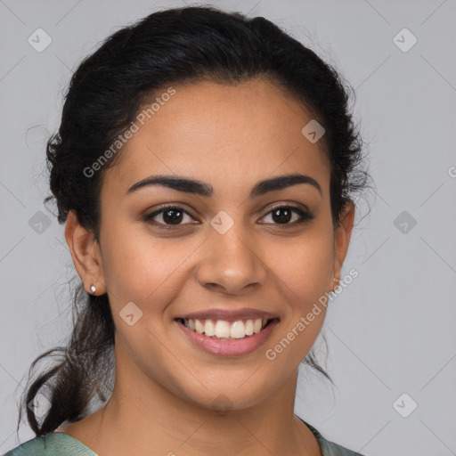 Joyful latino young-adult female with medium  brown hair and brown eyes