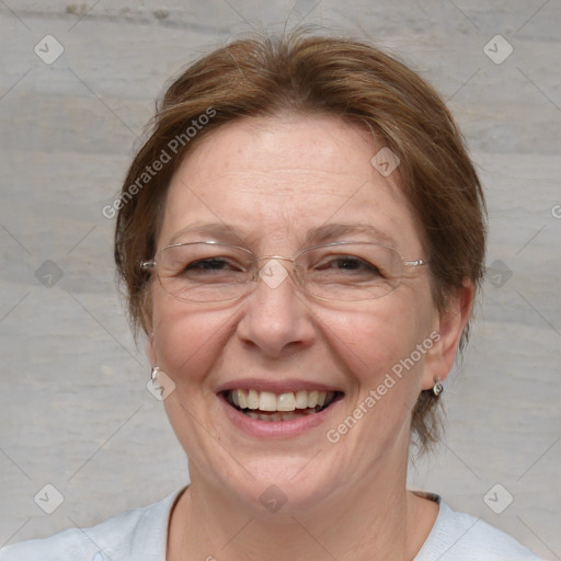 Joyful white adult female with medium  brown hair and blue eyes