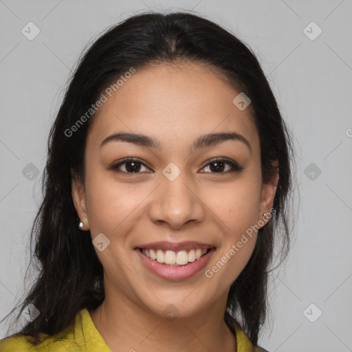 Joyful latino young-adult female with long  brown hair and brown eyes