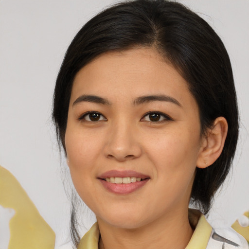 Joyful white young-adult female with medium  brown hair and brown eyes