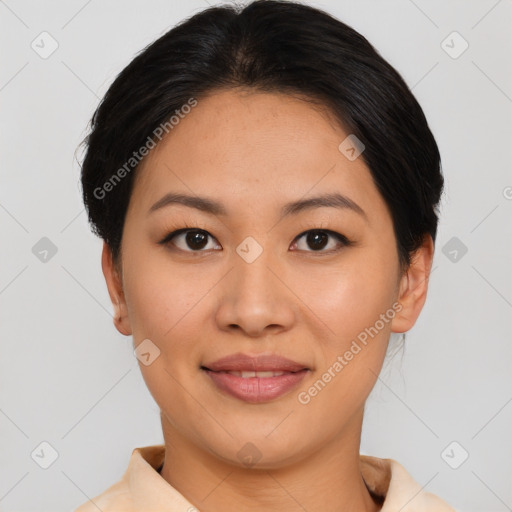 Joyful asian young-adult female with short  brown hair and brown eyes