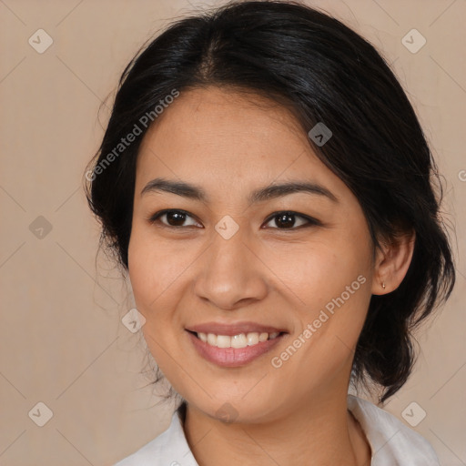 Joyful latino young-adult female with medium  brown hair and brown eyes