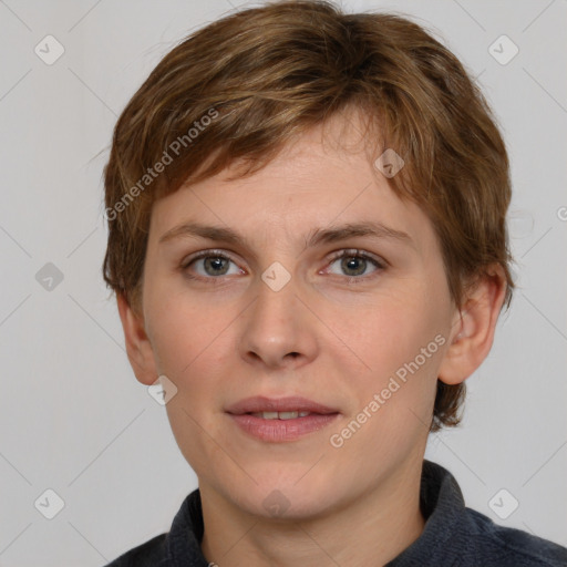 Joyful white young-adult female with medium  brown hair and grey eyes