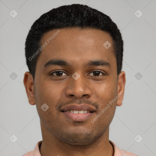 Joyful latino young-adult male with short  brown hair and brown eyes