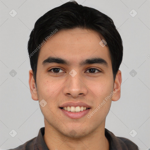 Joyful asian young-adult male with short  black hair and brown eyes