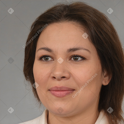 Joyful white adult female with medium  brown hair and brown eyes