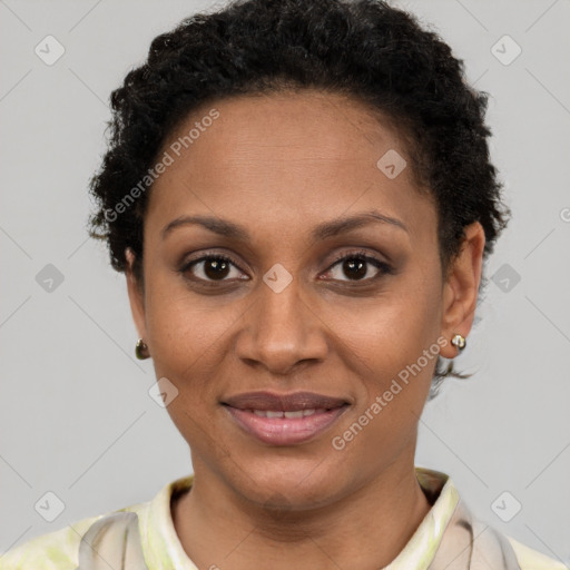 Joyful latino young-adult female with short  brown hair and brown eyes