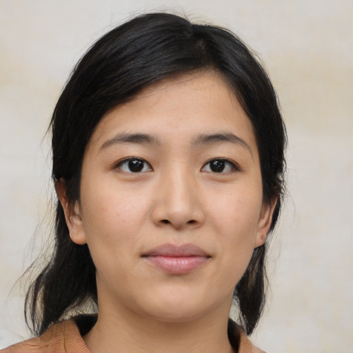 Neutral latino young-adult female with medium  brown hair and brown eyes