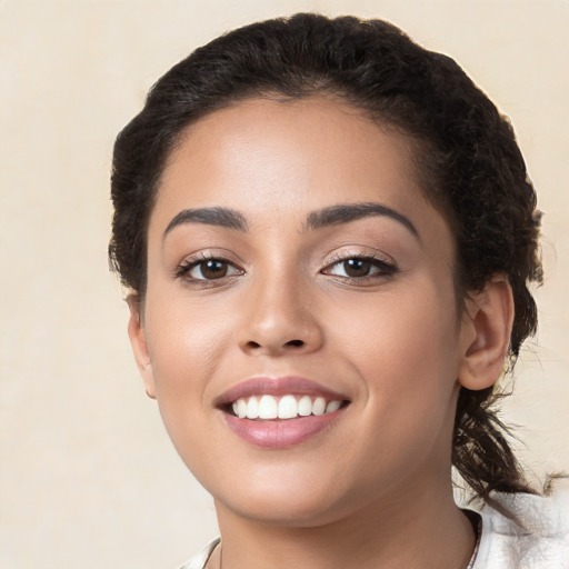 Joyful white young-adult female with medium  brown hair and brown eyes