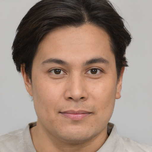 Neutral asian young-adult male with short  brown hair and brown eyes