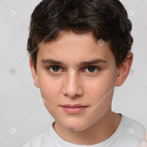 Joyful white child male with short  brown hair and brown eyes