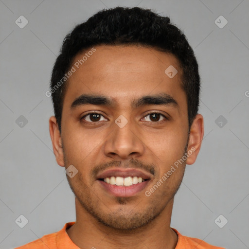 Joyful latino young-adult male with short  brown hair and brown eyes