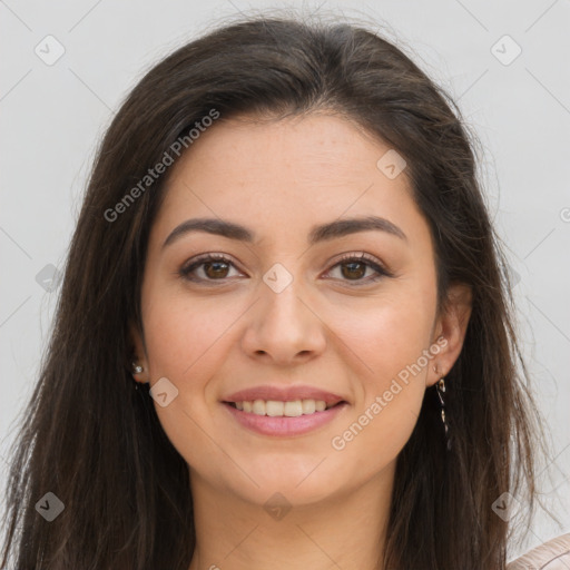 Joyful white young-adult female with long  brown hair and brown eyes