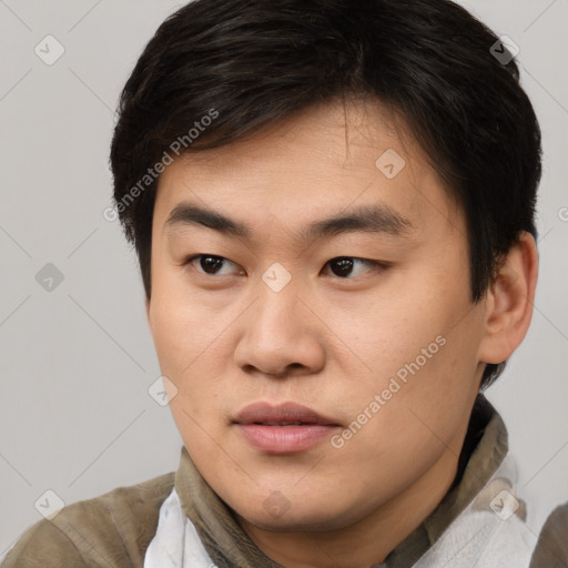 Neutral asian young-adult male with short  brown hair and brown eyes