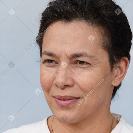 Joyful white adult female with short  brown hair and brown eyes