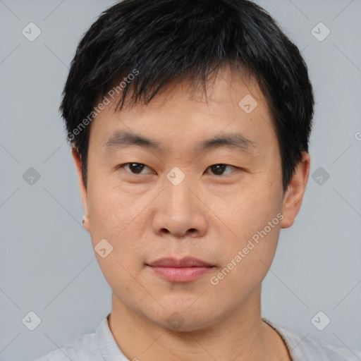 Neutral asian young-adult male with short  black hair and brown eyes