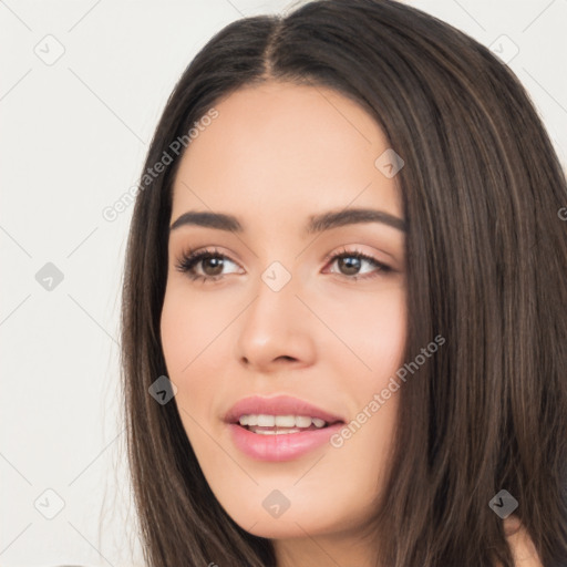 Joyful white young-adult female with long  black hair and brown eyes