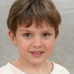 Joyful white child female with short  brown hair and brown eyes