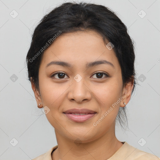 Joyful latino young-adult female with medium  brown hair and brown eyes