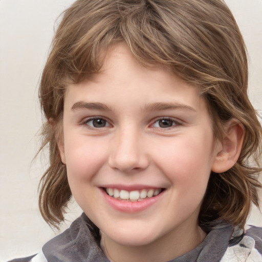 Joyful white child female with medium  brown hair and grey eyes