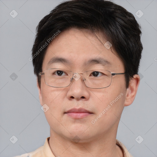 Neutral asian young-adult male with short  brown hair and brown eyes