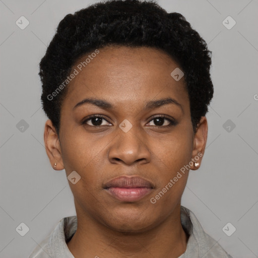 Joyful black young-adult female with short  black hair and brown eyes