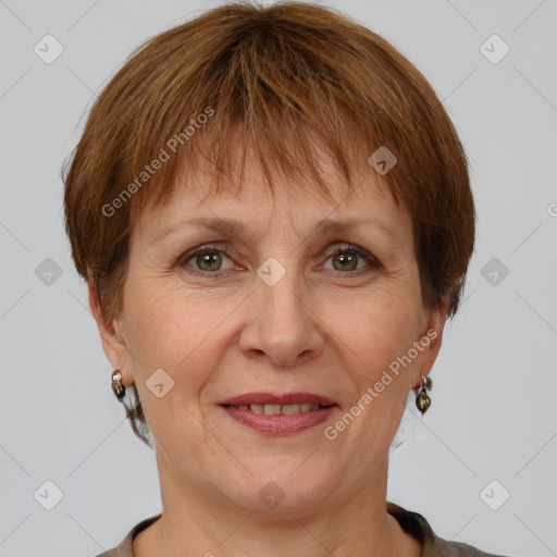 Joyful white adult female with short  brown hair and grey eyes