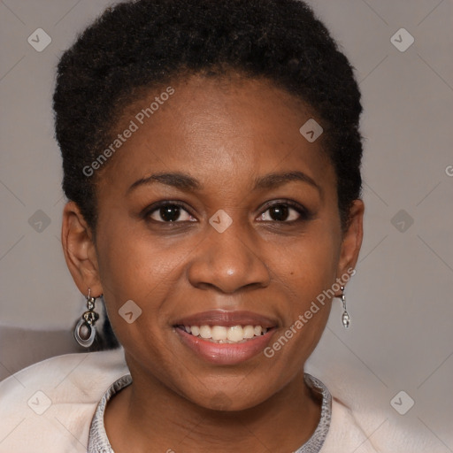 Joyful black young-adult female with short  brown hair and brown eyes