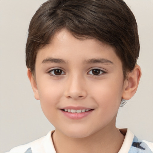 Joyful white child male with short  brown hair and brown eyes