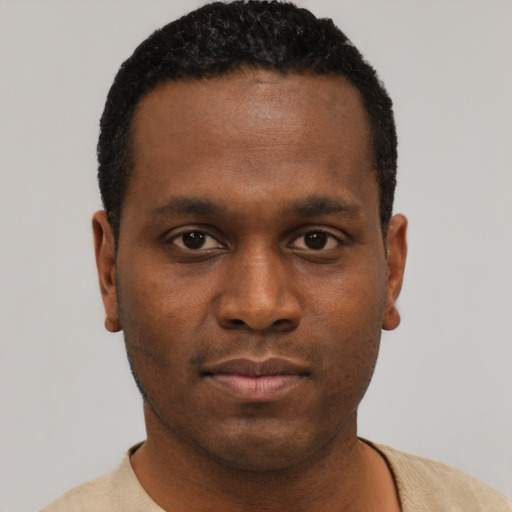Neutral black young-adult male with short  black hair and brown eyes