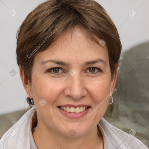 Joyful white adult female with short  brown hair and brown eyes