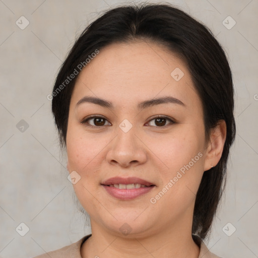 Joyful asian young-adult female with medium  brown hair and brown eyes